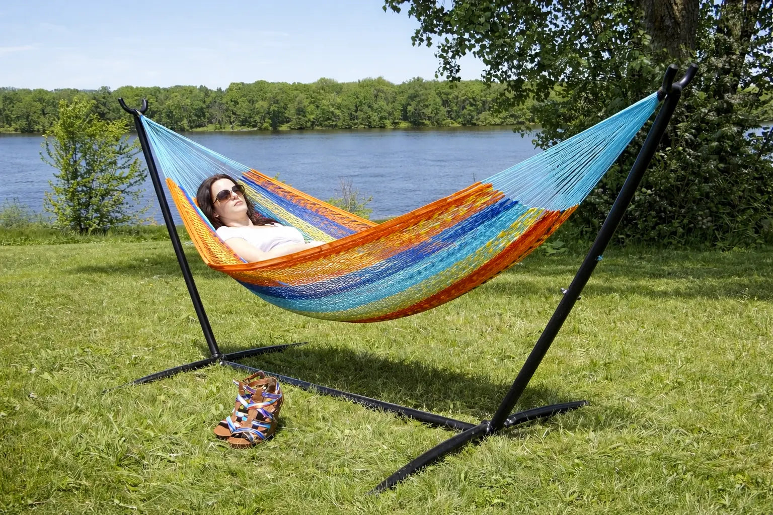 Colorful hammock with a stand on grass by a lake  #24-MHXLTC-H+75121