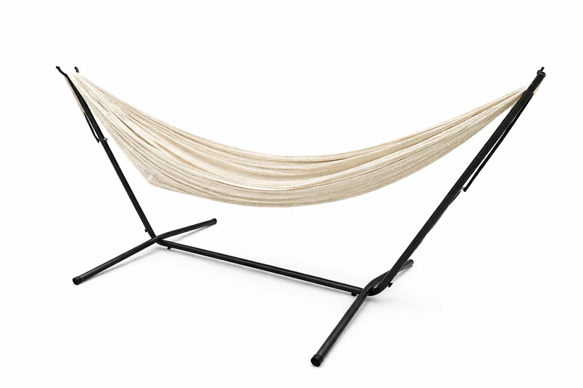 Beige hammock on a black stand against a white background  #24-MHXLTC-N+75121